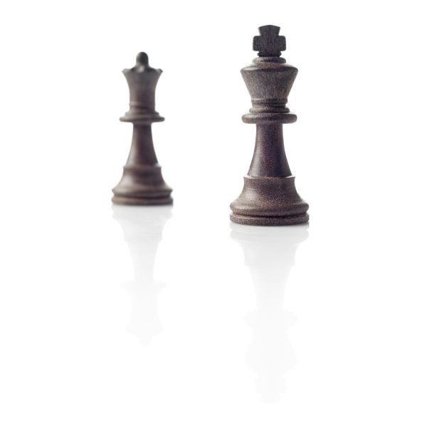 Chess. Black King and Queen, leadership concept on white background.