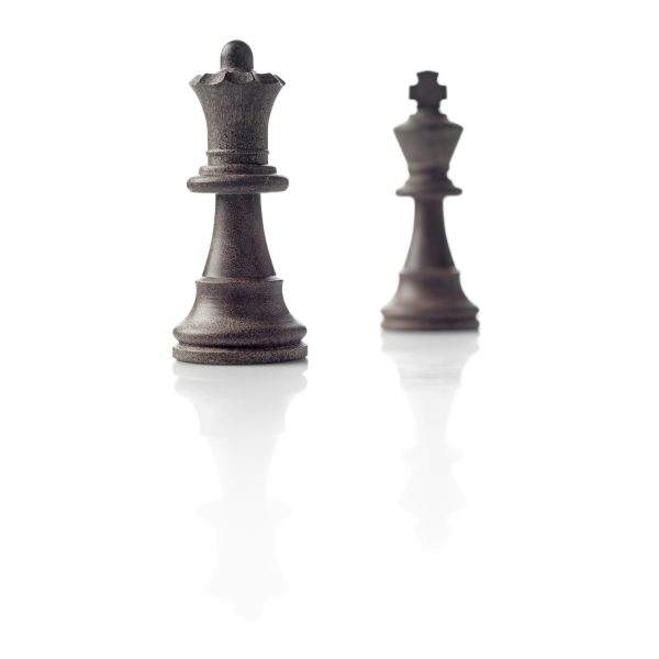 Chess. Black Queen and King, leadership concept on white background.